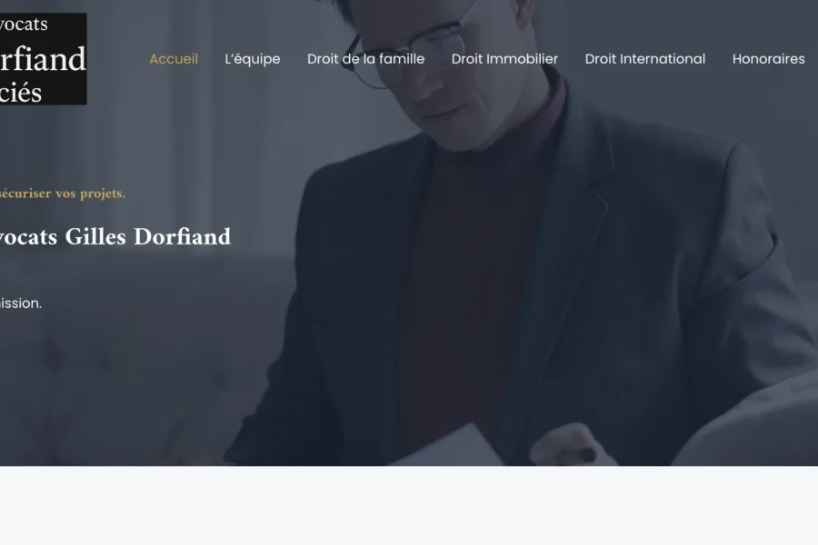 Page d'accueil du site du Cabinet d'avocats Gilles Dorfiand & Associés sur fond photographique sombre.