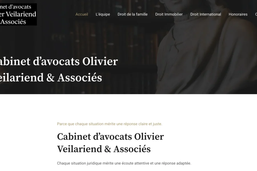 Coupe d'écran du site web du cabinet d'avocats Olivier Veilariend et Associés affichant le nom de la société en lettres blanches sur un fond sombre ainsi que le menu de navigation.