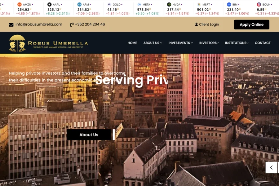 Interface web de Robus Umbrella affichant un slider d'immeubles parisiens et des actions boursières.